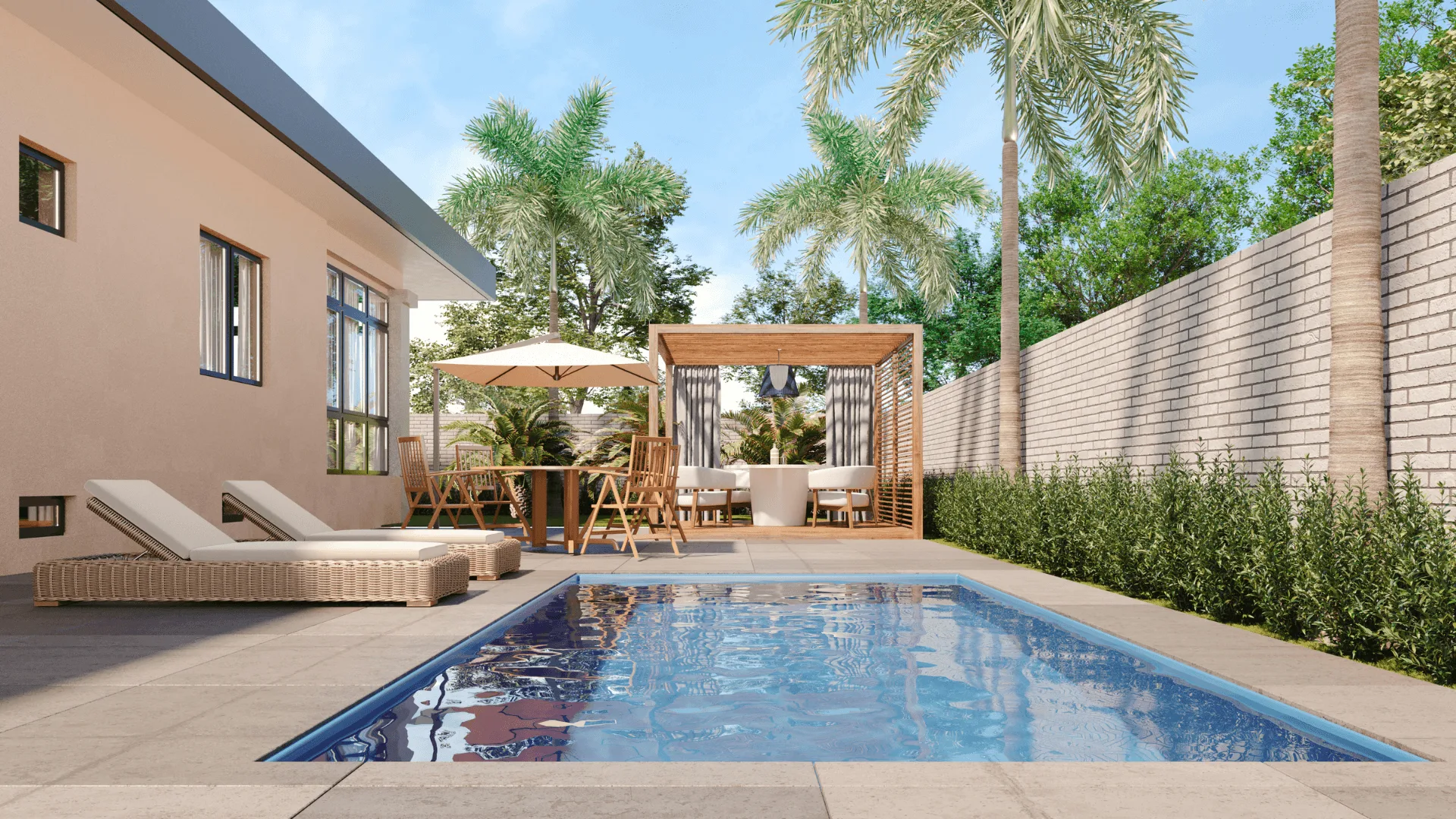 Fibreglass swimming pool surrounded by lounge chairs and a shaded seating area in a landscaped backyard.